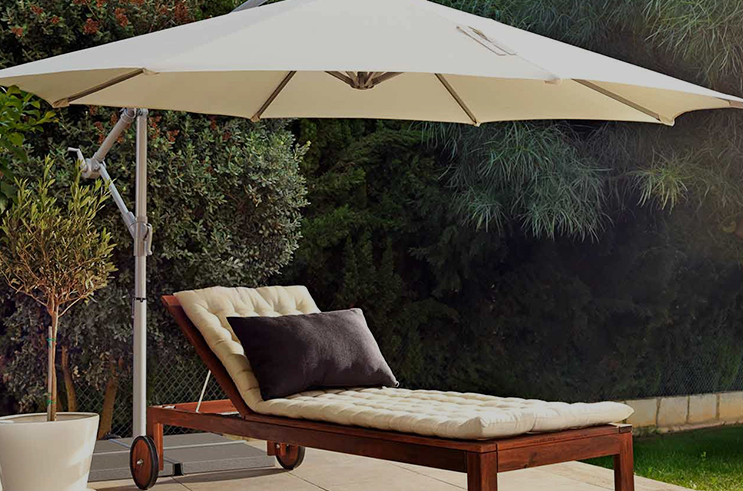 Kako materijal kišobrana popločane popločane dvorišta utječe na trajnost i zaštitu od sunca?